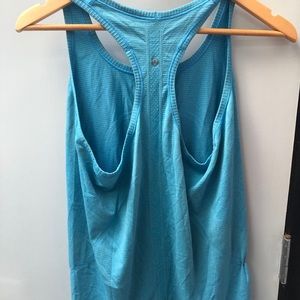 lululemon athletica Tops - Lululemon blue run swiftly tank sz 12 lululemon athletica Tops - Lululemon blue run swiftly tank sz 12